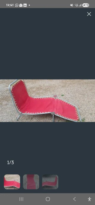 Hamaca de tela y metal roja