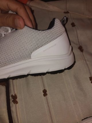 Zapatos d'foot blancos