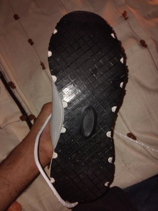 Zapatos d'foot blancos