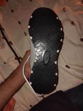 Zapatos d'foot blancos