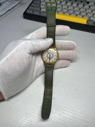 Swatch Reloj Oro y Verde