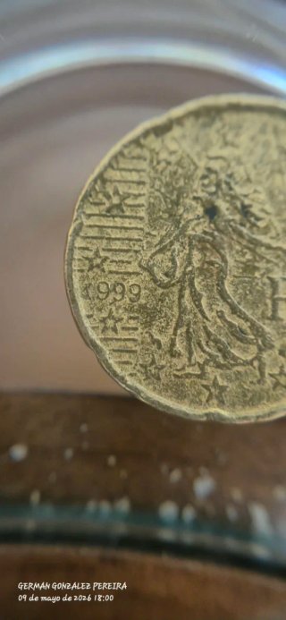 Moneda 1999 con error