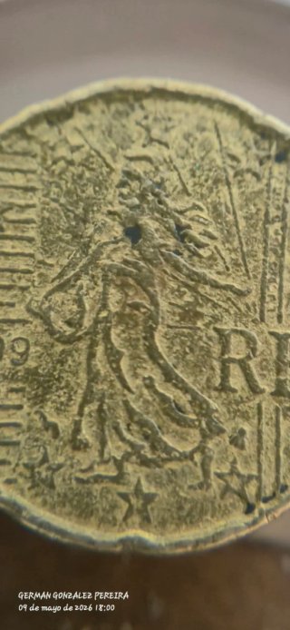 Moneda 1999 con error