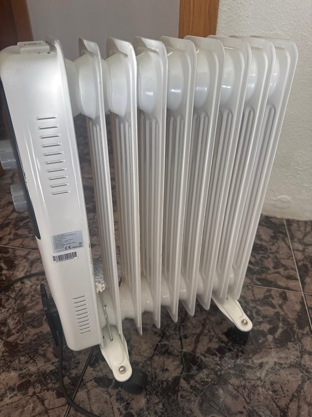 Estufa eléctrica radiador