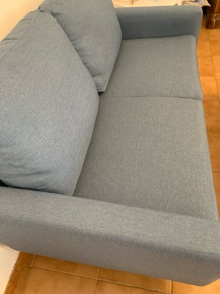 Divano blu in tessuto