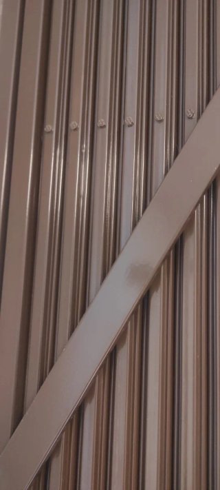 Reja de ballesta metálica color marrón