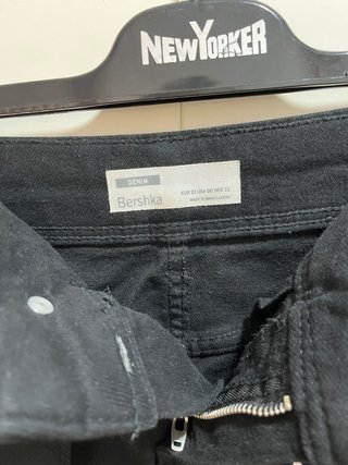 Falda tejana mini negra con cinturón