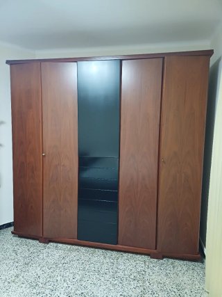 Dormitorio matrimonio completo de madera oscura