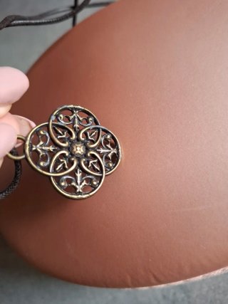 Collana etnica ciondolo fiore cordino regolabile