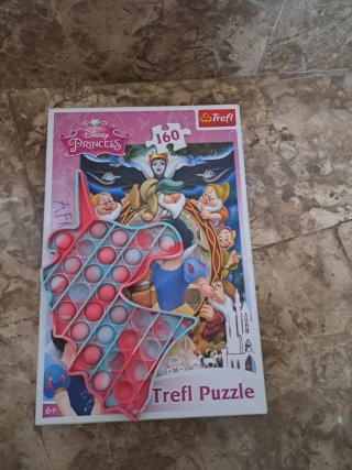 Puzzle Disney 160 piezas. pop it unicornio