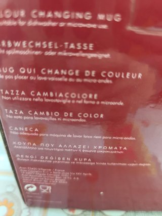 Taza de cerámica beige y marrón