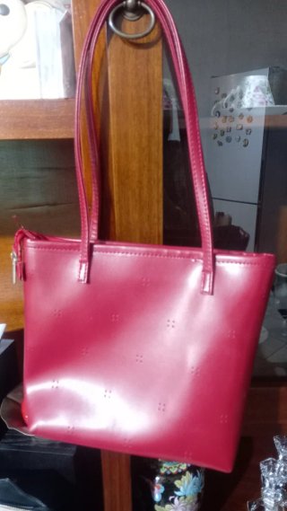 Borsa a mano rossa con fiocco