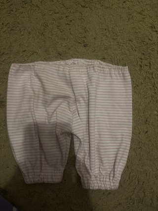 Ropita de muñeca rosa a rayas