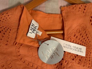 Conjunto Lady Pipa Top y Falda Naranja