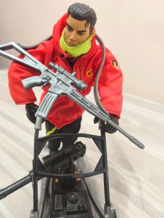 Figura Action Man con trineo y perro