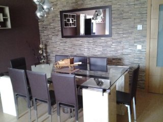 Mesa de comedor de mármol y cristal