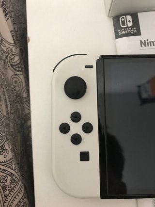 IMPECABLE!!! Nintendo Switch OLED + accesorios!