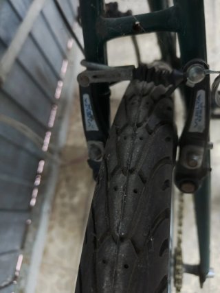 Bicicleta Orbea verde con piezas nuevas