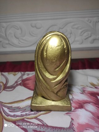 Statua dorata testa Madonna