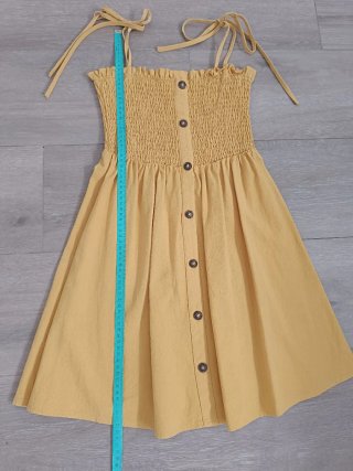 Vestido amarillo niña botones