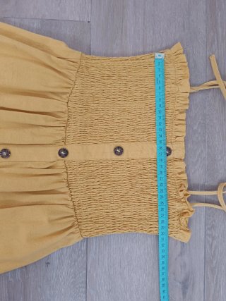 Vestido amarillo niña botones