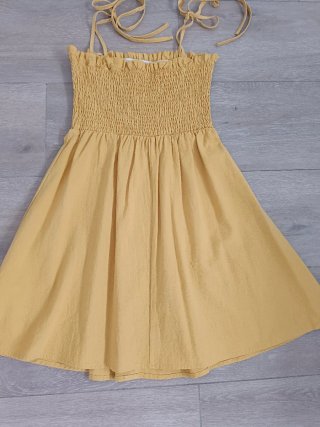 Vestido amarillo niña botones