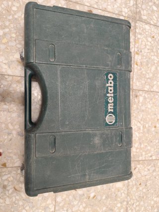 Taladro percutor Metabo con maletín