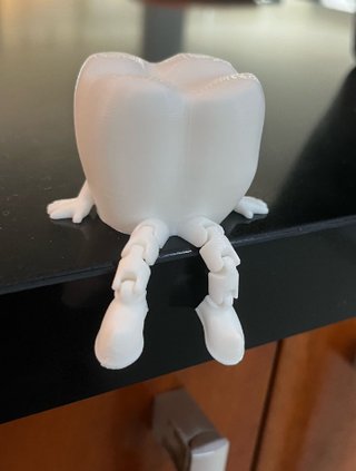 Dente Decorativo Sentado