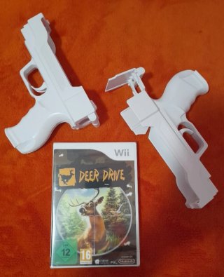 PRECINTADO.Juego Wii Deer Drive+2 Pistolas NUEVAS