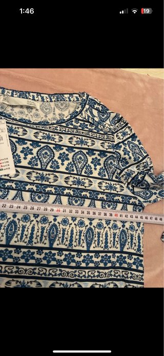 Blusa estampada azul y blanca Talla L