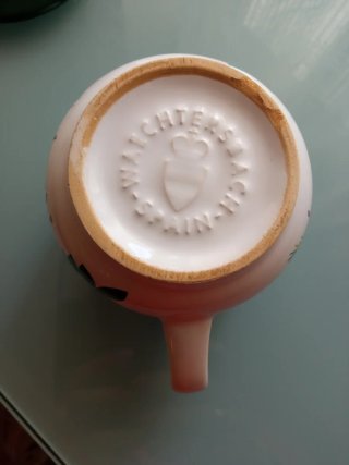 Taza de cerámica con tapa y colador