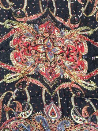 Pañuelo estampado con flecos