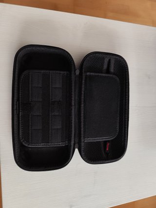 Nintendo Switch + funda azul y roja