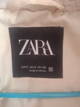 Cazadora efecto pelo beige mujer