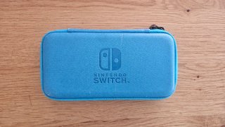 Nintendo Switch Lite Turchese + Custodia + Gioco