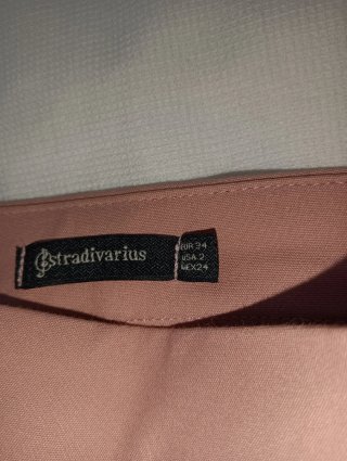 Conjunto pantalón rosa y top negro