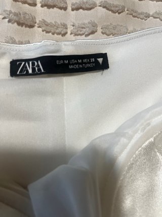 Body de satén blanco con tirantes