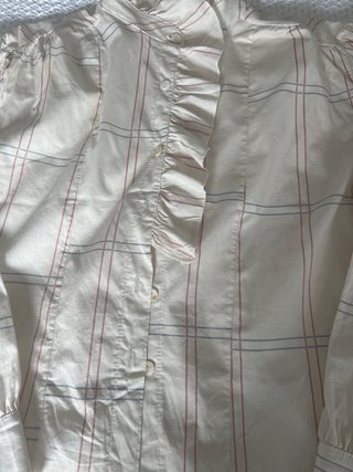 Blusa de cuadros con volantes