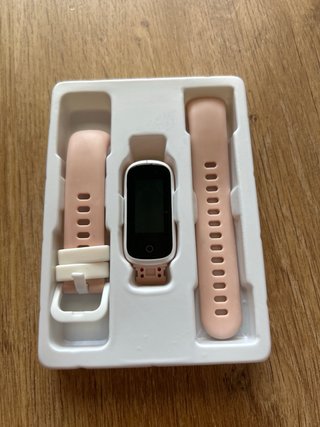 Reloj inteligente rosa y blanco