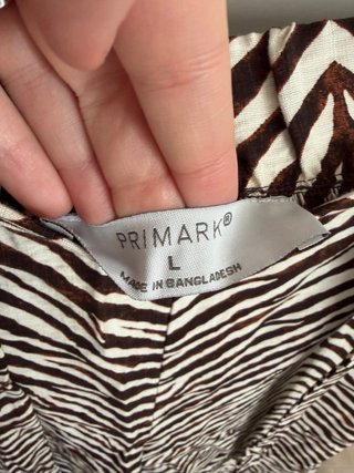 Pantalón ancho estampado cebra marrón y beige