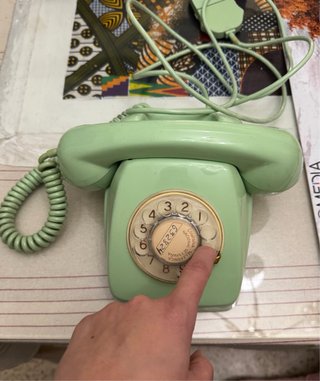 Teléfono antiguo de disco año 1977