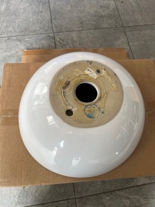 Lavabo redondo de porcelana blanco