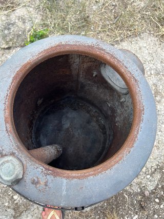 Estufa de leña redonda de metal