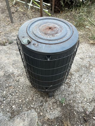 Estufa de leña redonda de metal