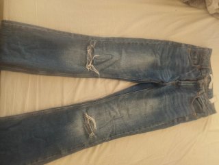 Pantalones vaqueros desgastados Campana