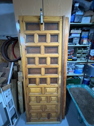 Puerta madera castellana cuarterones