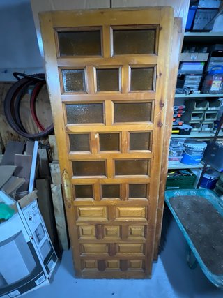 Puerta madera castellana cuarterones