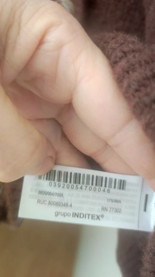 Chaqueta de punto marrón con bolsillos