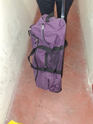 Maleta de viaje morada