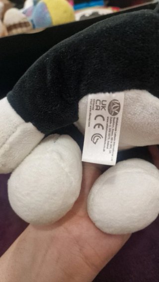 Peluche gato blanco y negro